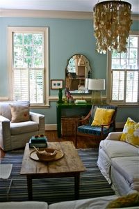 casual living room- Benjamin Moore's Wythe Blue more subtle but still has pops of green and yellow nice!